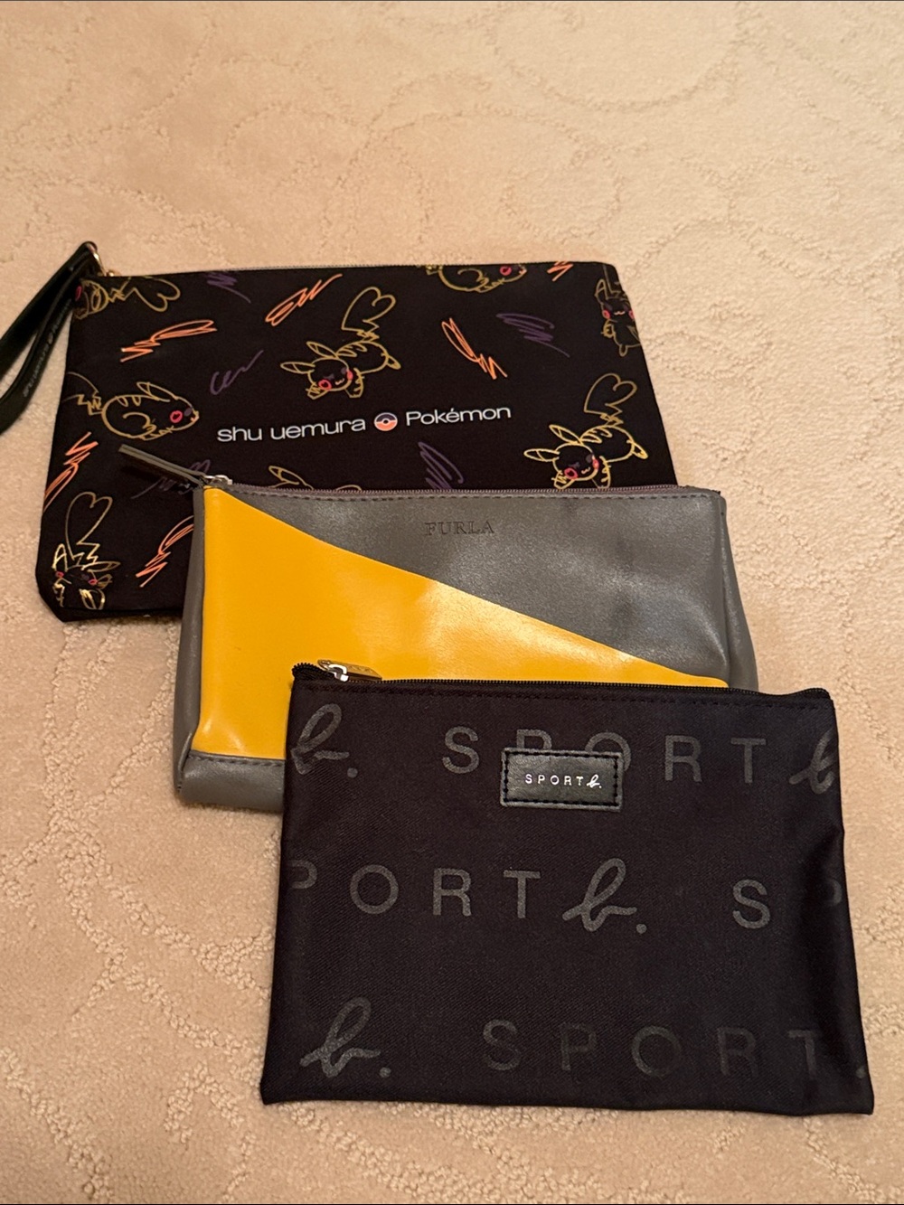 Assortment of pouches: 3 make up pouches Shu Uemura Black Pokémon furla Agnes B